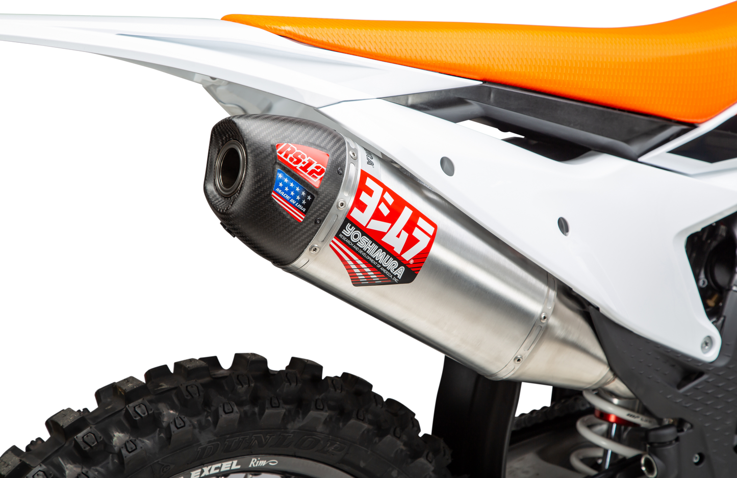 YOSHIMURA RS-12 slip-on exhaust installed on KTM and Husqvarna motorcycles, showcasing the sleek silver and black design.