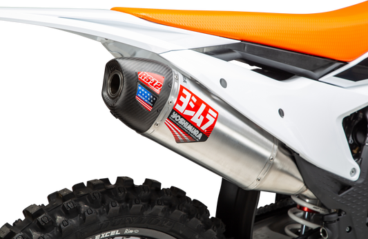 YOSHIMURA RS-12 slip-on exhaust installed on KTM and Husqvarna motorcycles, showcasing the sleek silver and black design.