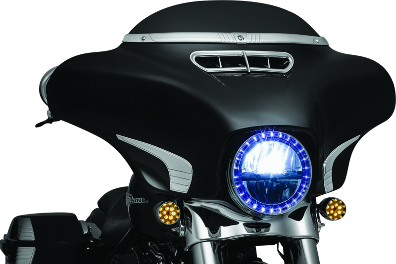 Chrome Kuryakyn Tri-Line Windshield Trim on Harley Davidson Touring motorcycle, showcasing sleek, polished motorcycle windshield accessory.