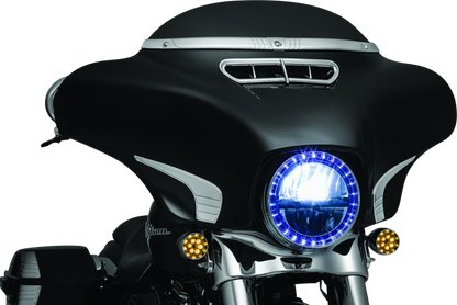Chrome Kuryakyn Tri-Line Windshield Trim on Harley Davidson Touring motorcycle, showcasing sleek, polished motorcycle windshield accessory.