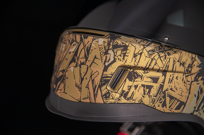 Bill's Exhausts ICON Airform Guardian Gold Helmet, large size, with sleek aerodynamic design and reflective gold finish.