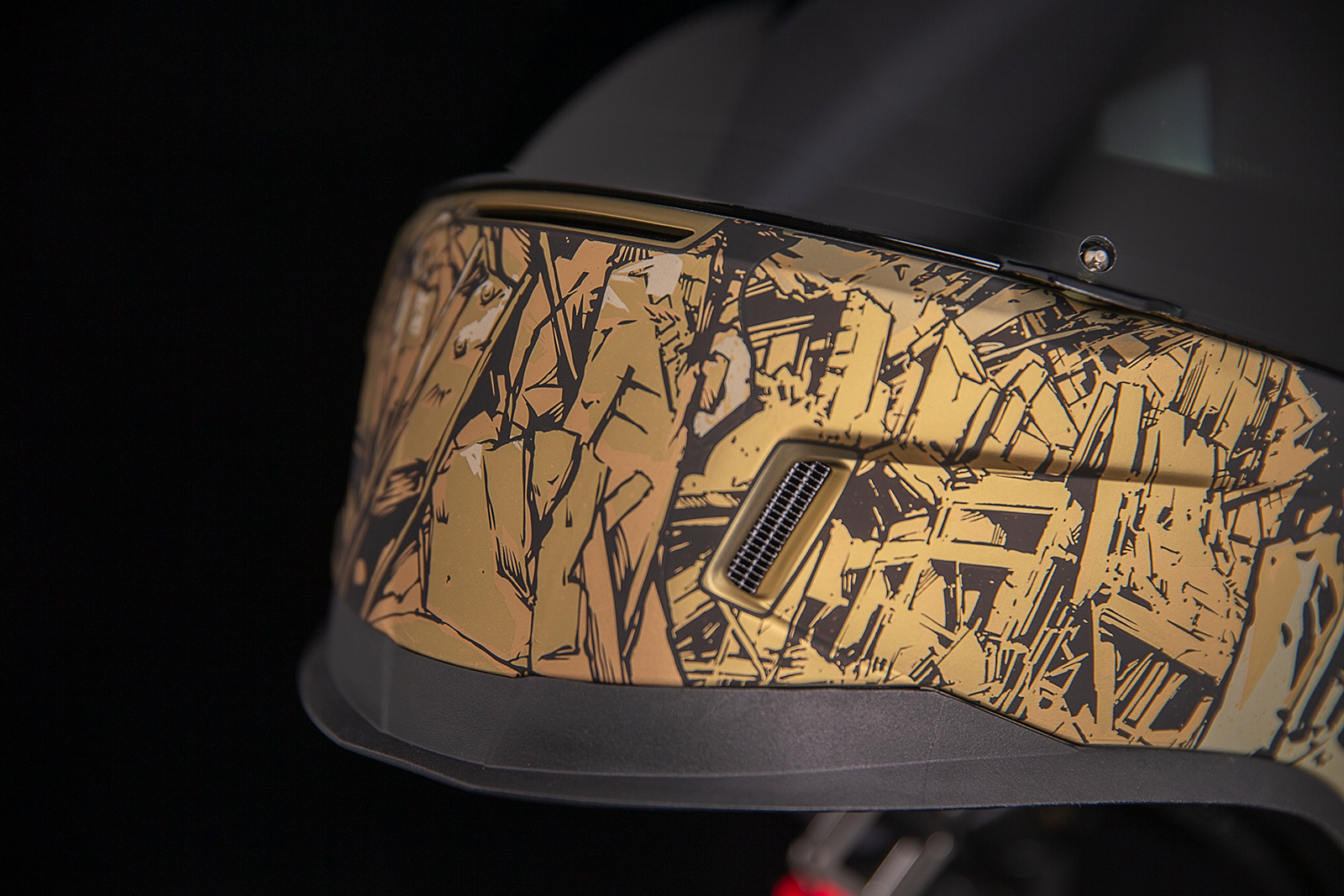 Gold ICON Airform™ Guardian helmet in 2XL size with a sleek aerodynamic design, featuring the iconic brand logo on the helmet surface.