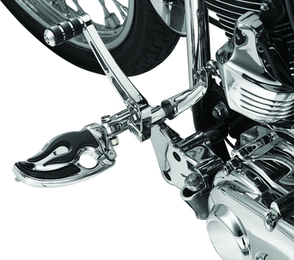 Chrome Kuryakyn Flamin Switchblade power sports footpeg with male mount adapter on motorcycle, featuring a sleek, stylish design.