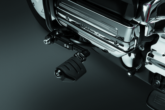Kuryakyn Ergo III adjustable cruise mount with Trident Dually ISO Pegs in gloss black for motorcycle passenger comfort and style