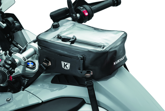 Kuryakyn Torke 7L dry tank bag with backpack straps, waterproof design, mounted on motorcycle fuel tank.