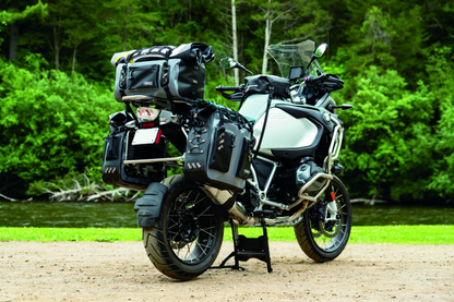 Kuryakyn Torke 24L dry bag panniers for power sports, waterproof motorcycle storage solution with secure straps and durable material.