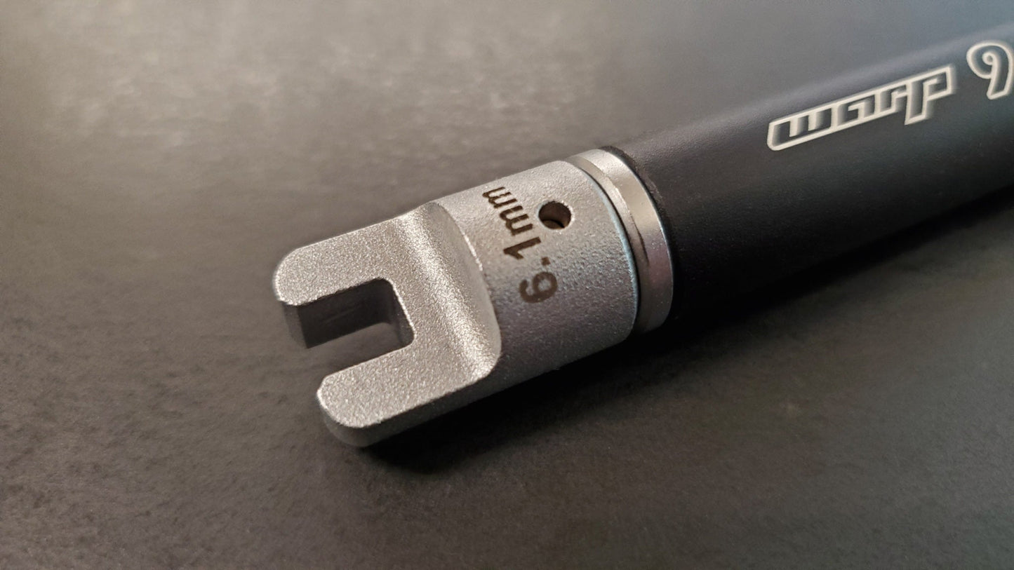 Warp9Racing spoke wrench tip in 6.1mm size, designed for adjusting bicycle spokes, shown on a tools image.