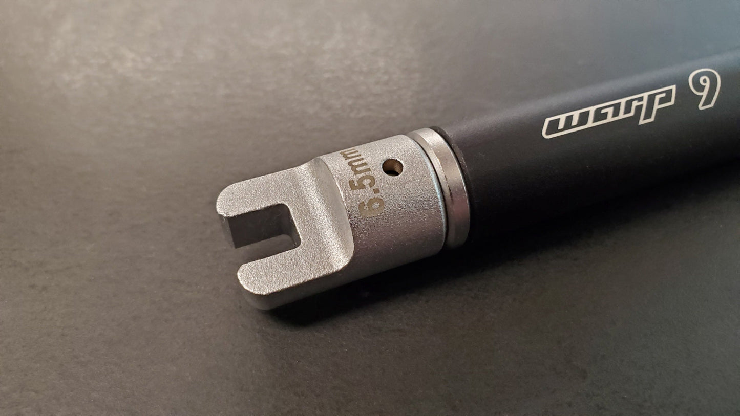 Warp9Racing spoke wrench tips, 6.5mm adjustable tools for bicycle wheel maintenance, shown in the image.