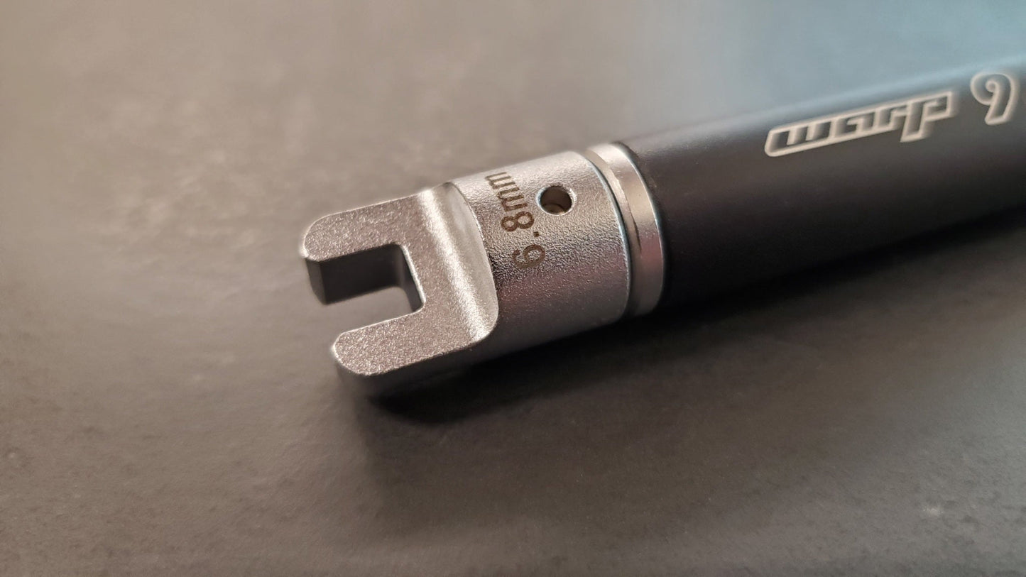 Warp9Racing spoke wrench tips, 6.8mm adjustable tool for bicycle wheel spokes, shown in the image.