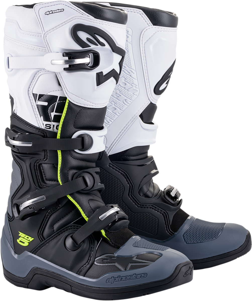 Alpinestars Tech 5 motorcycle boots in black and white, US 14, with protective design and sturdy construction.