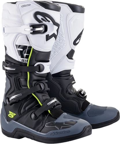 Alpinestars Tech 5 motorcycle boots in black and white, US 14, with protective design and sturdy construction.