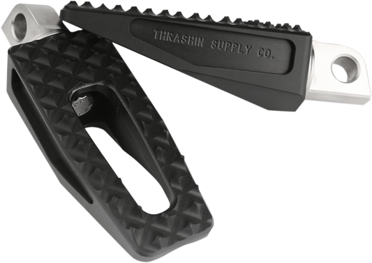 Black THRASHIN SUPPLY CO. P-54 slim foot pegs for motorcycle, shown in close-up view with detailed metal finish.