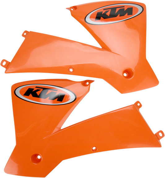 Orange ACERBIS radiator shrouds for motorcycle body, featuring sleek design and vibrant color, suitable for off-road or motocross bikes.