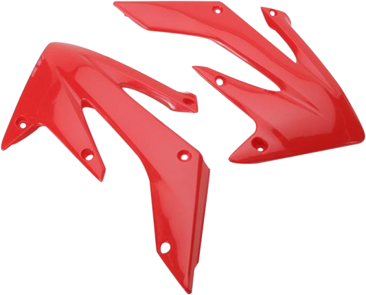 Red Acerbis radiator shrouds for motocross bikes, designed by Bill's Exhausts, featuring sturdy body protection and vibrant color.