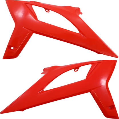 Red ACERBIS full replacement body kit for motorcycles, featuring sleek body panels with detailed design and brand markings.