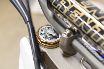 Motion Pro compression adjuster for KYB AOS SSS forks, part number 11-0124, shown installed on motorcycle suspension.