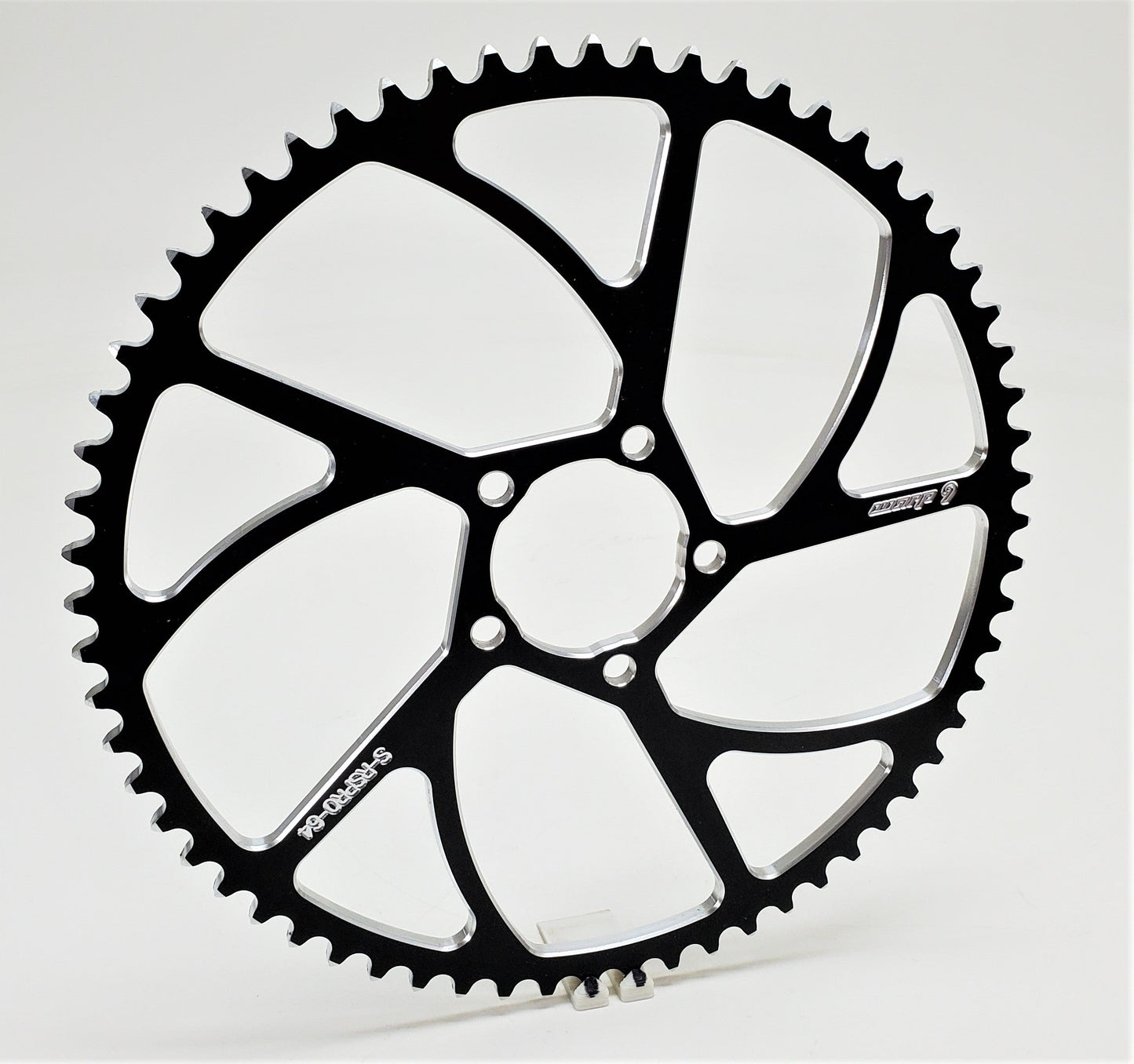Warp 9 Racing E-Moto rear sprocket with 64 teeth, made of aluminum and stainless steel, suitable for Surron and Talaria bikes.