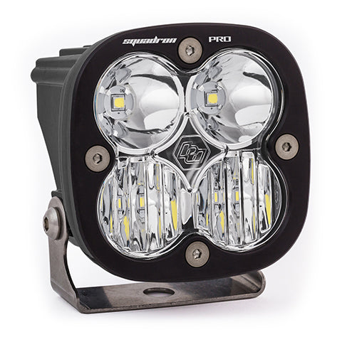 Elektrisches Racing Squadron Pro Black LED Auxiliary Light Pod mounted on a Surron electric bike for enhanced visibility.