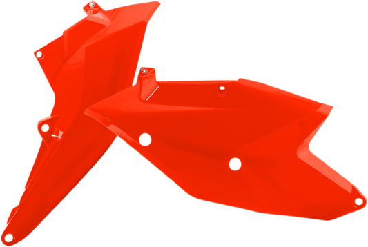 Acerbis fluorescent orange motorcycle side panel with body design, showcasing vibrant color and sleek shape.