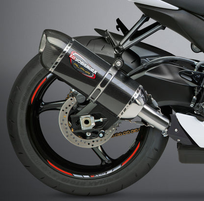 YOSHIMURA Signature Alpha slip-on exhaust with matte carbon fiber end cap, showcasing sleek motorcycle exhaust design.