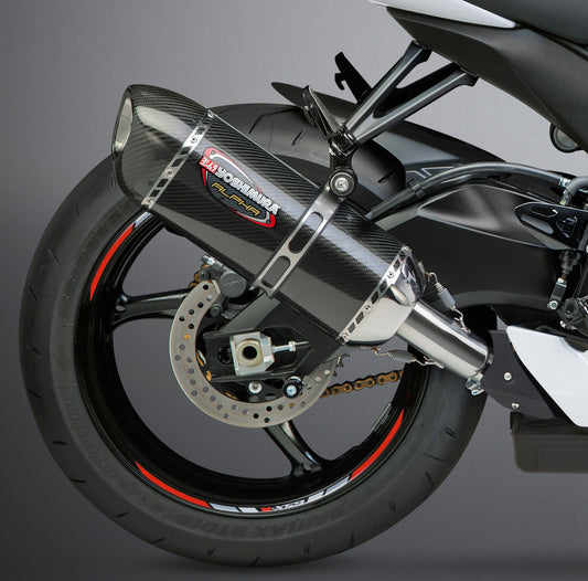 YOSHIMURA Signature Alpha slip-on exhaust with matte carbon fiber end cap, showcasing sleek motorcycle exhaust design.