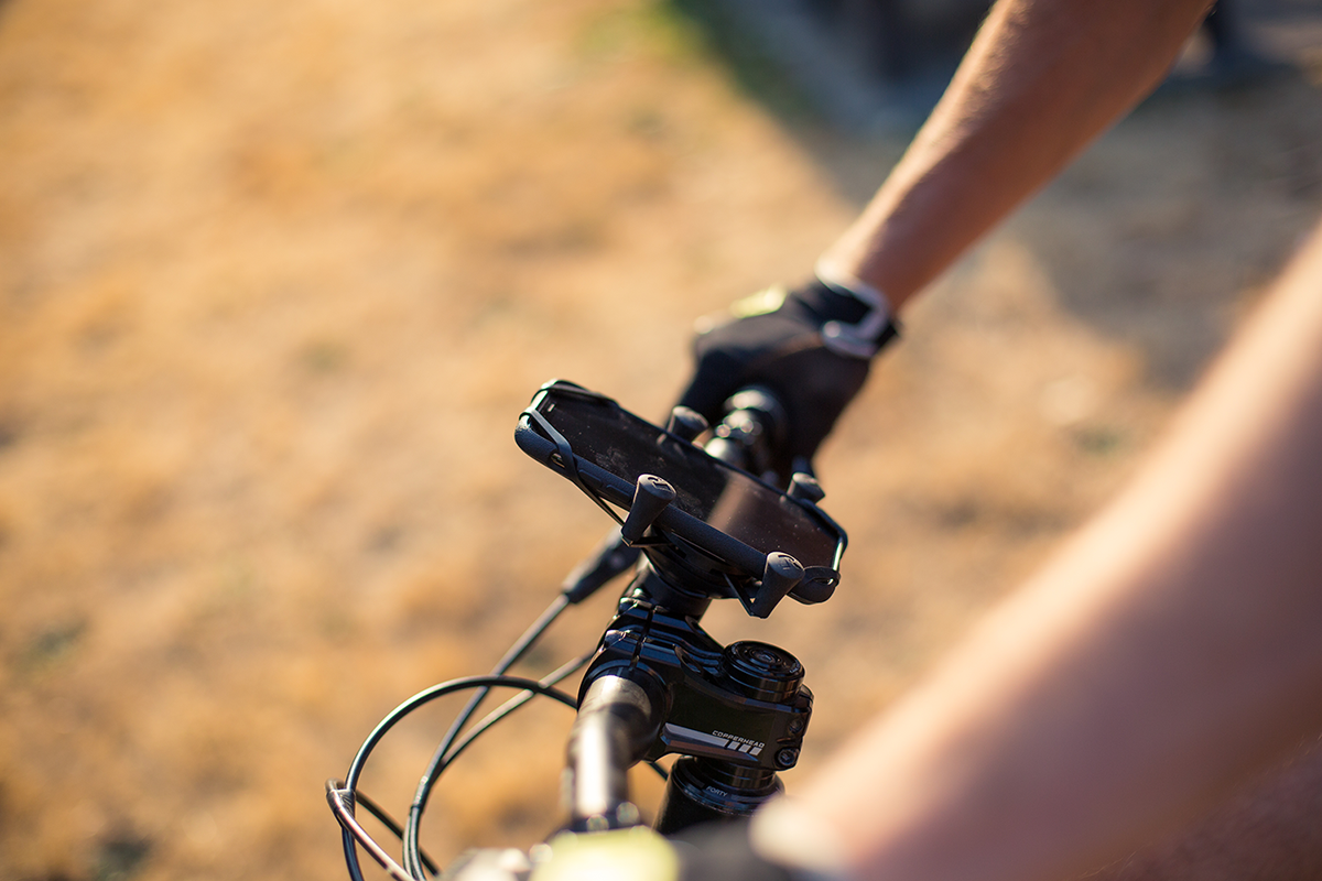 Bill's Exhausts RAM MOUNTS X-Grip Kit with bicycle base for engine mounting, featuring secure grip and durable construction.