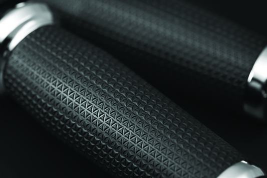 Kuryakyn Thresher motorcycle grips for 2018-2019 Indian models in chrome, featuring textured design and ergonomic shape.