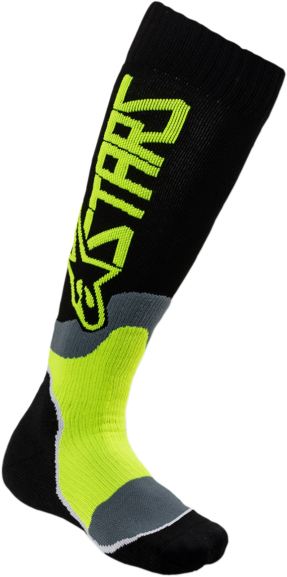 Alpinestars MX Plus 2 youth protective gear socks in black and yellow, medium/large size, featuring reinforced comfort and support.