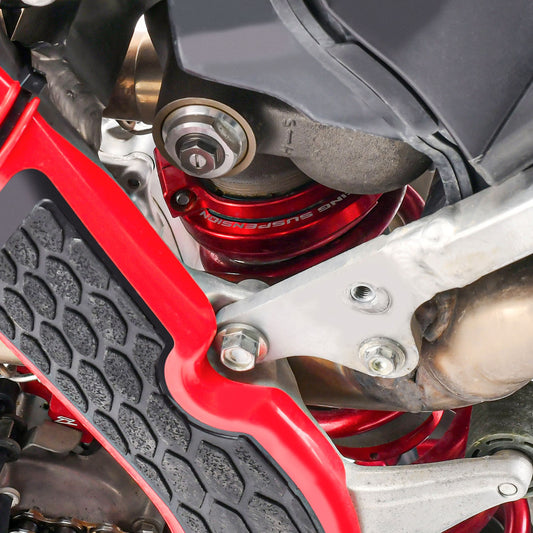 ZETA Preload Adjuster Show50a for motorcycle forks, showing easy spring tension adjustment with tool and fork components.