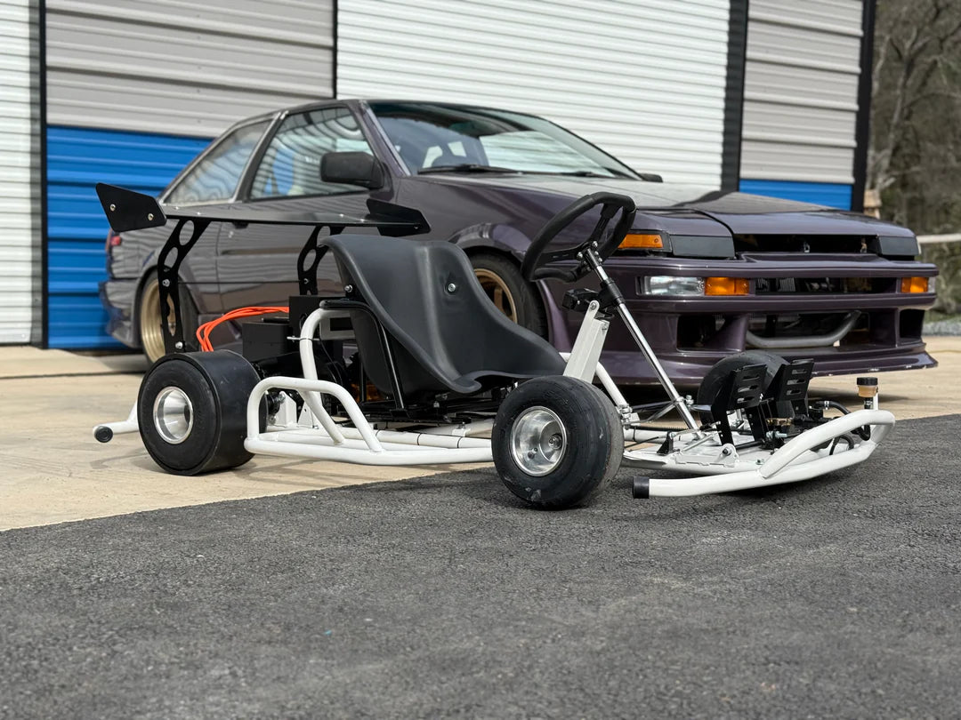 Electro & Co ETM E-Drift Kart electric drift kart with sleek design, black and red color, ready for outdoor racing fun.