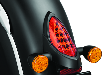 Kuryakyn satin black tail light top trim for Indian motorcycles, designed to enhance rear lighting and style.