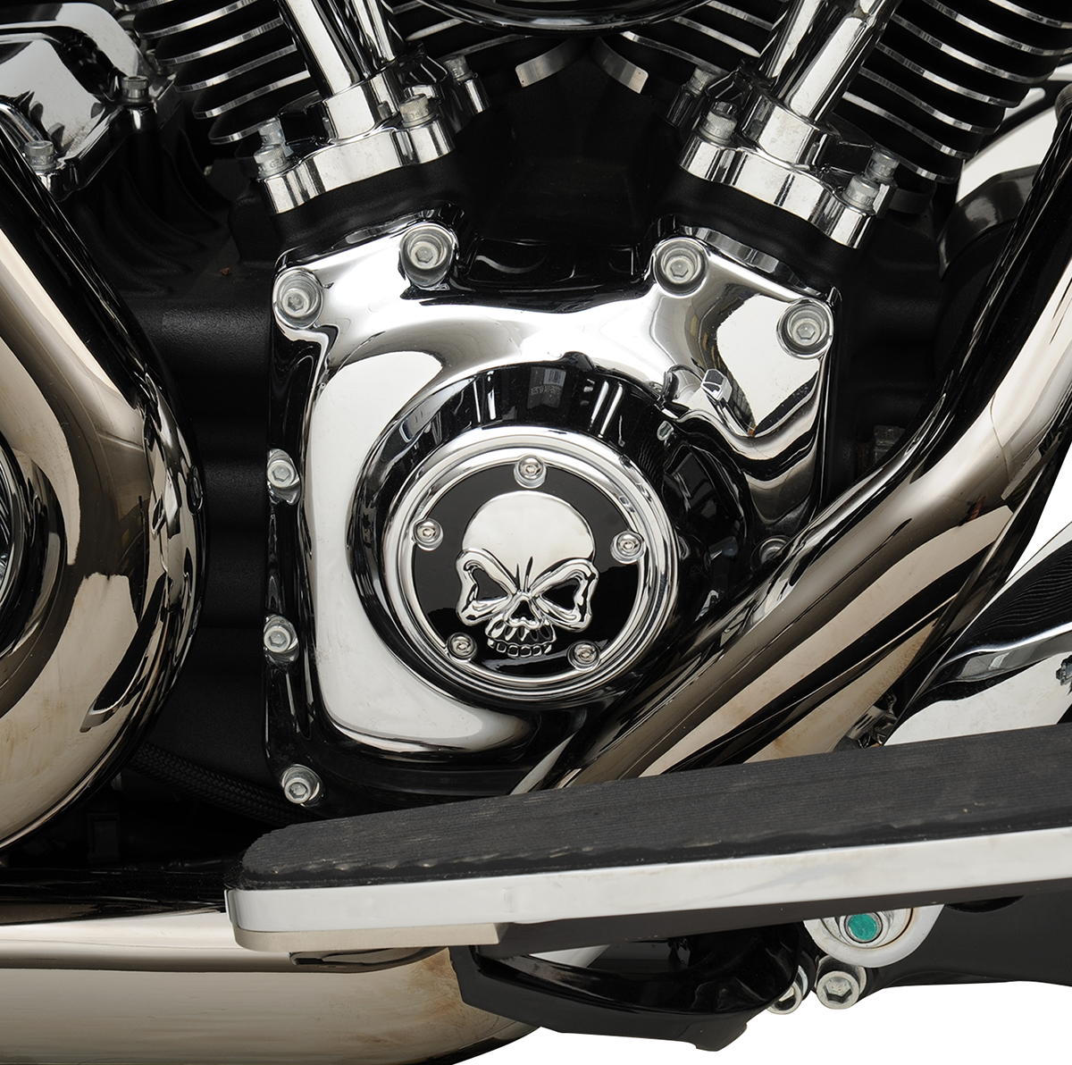 Chrome skull points cover for motorcycle ignition switch by Drag Specialties, featuring a detailed skull design.