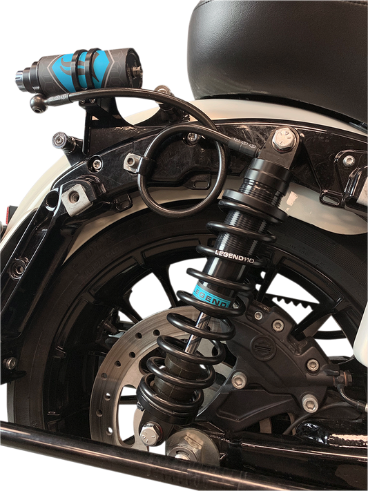 Legend Suspension Revo ARC external reservoir mount for Harley Touring models, part 1313-0167, with metal construction and mounting hardware.