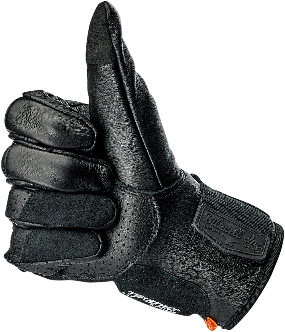 Black BILTWELL Borrego gloves in XL size, showing the textured leather design and secure wrist strap.