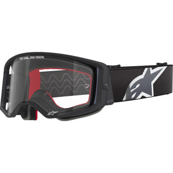 Alpinestars Supertech goggles in black and gray with clear lenses, designed for motorcycle racing or sports use.