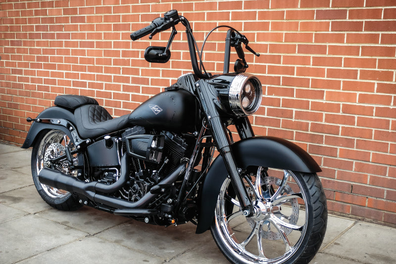 Kuryakyn Heavy Industry motorcycle grips with throttle-by-wire system in black, featuring textured rubber for enhanced grip.