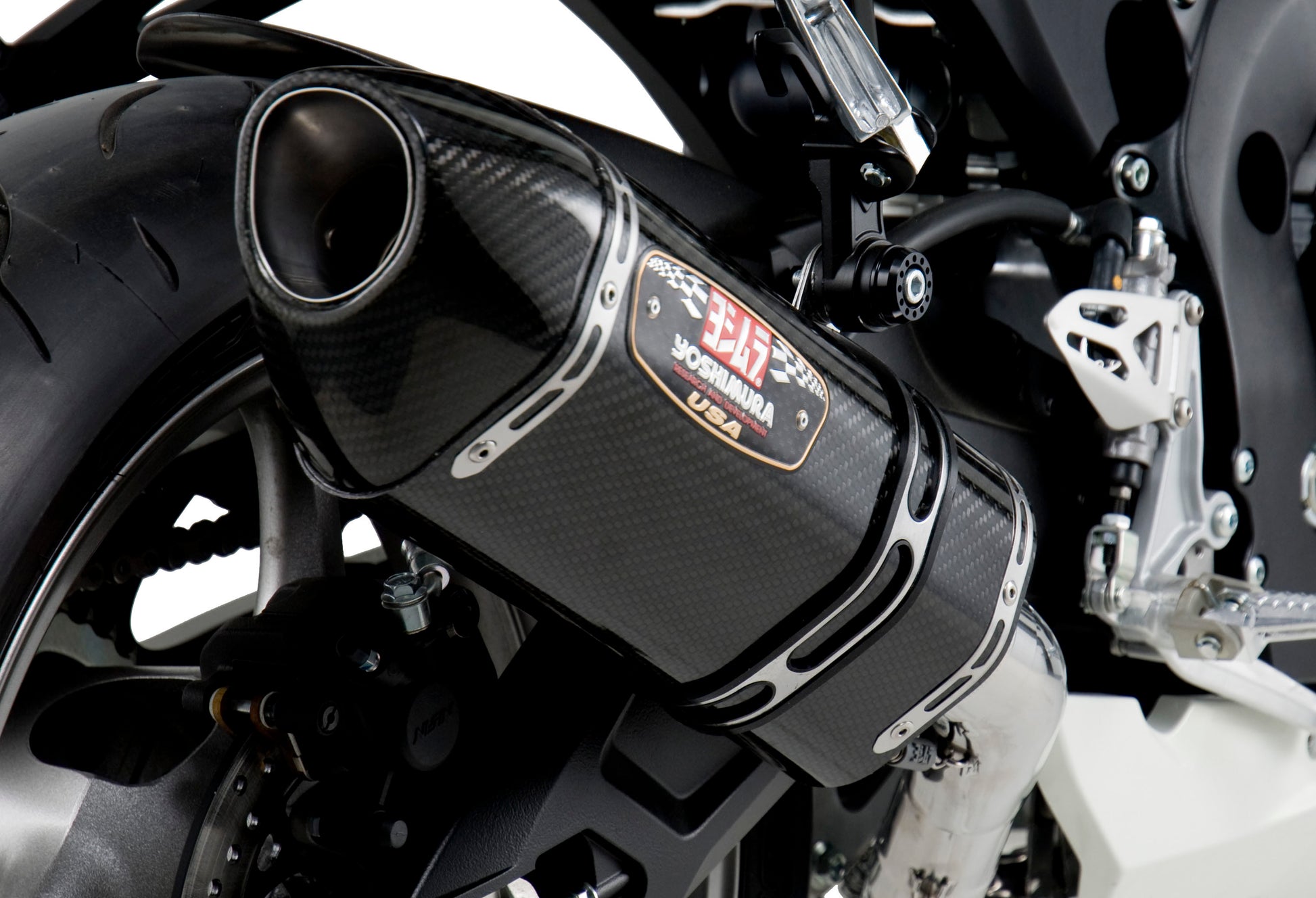 YOSHIMURA Yoshimura Exhaust Race R 77 full system with stainless steel and carbon fiber components, showcasing the polished exhaust and headers.