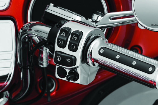 Kuryakyn Chrome Switch Housings for Harley Davidson motorcycle, showing polished chrome finish and detailed switch components.