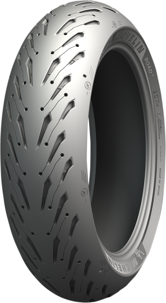 Michelin Road 5 rear motorcycle tire 180/55ZR17 (73W) with tread pattern, mounted on wheel for motorcycle riding.