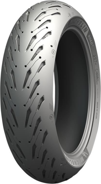 Michelin Road 5 rear motorcycle tire 180/55ZR17 (73W) with tread pattern, mounted on wheel for motorcycle riding.