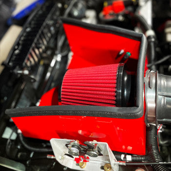 Polaris Slingshot cold air intake kit by Bill's Exhausts, showing the chrome performance air intake components and hoses.