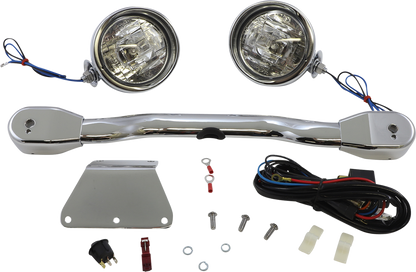 Bill's Exhausts SHOW CHROME driving light kit for XVS1300 motorcycle, engine-mounted lights with chrome finish, mounted on the engine area.