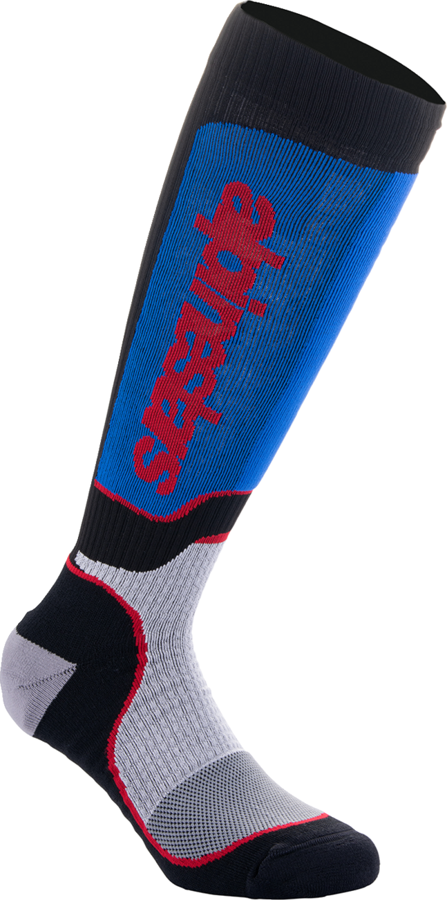 Alpinestars MX Plus motorcycle socks in black, red, white, and blue with reinforced toe and heel for motocross riding.