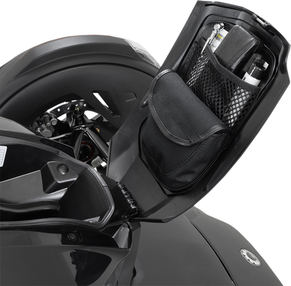 Bill's Exhausts Can-Am glove box organizer for engine storage, black plastic with compartments, fits Can-Am vehicles.