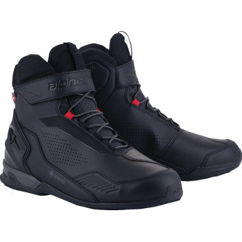 Alpinestars Austral GTX motorcycle boots in black and dark gray, US 9.5, featuring rugged design and waterproof materials.