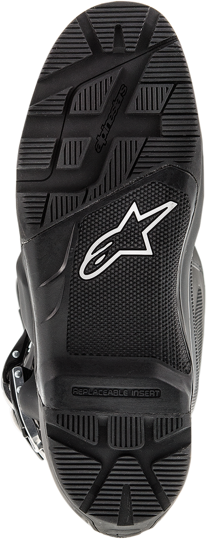 Alpinestars Tech 7 Enduro motorcycle boots in black with US 12 size, showing sturdy construction and secure fastening details.