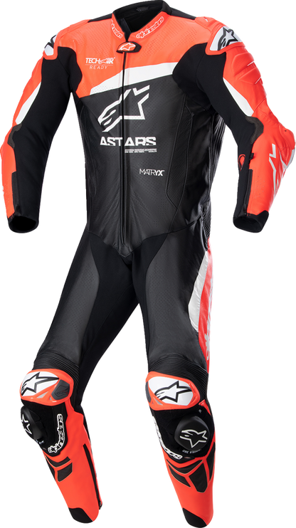 Alpinestars GP Plus v4 leather suit in black, red fluo, and white, displayed on a mannequin, US 48 / EU 58.