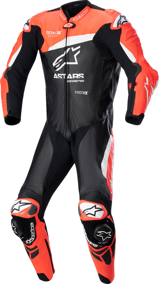 Alpinestars GP Plus v4 leather motorcycle suit in black, red fluo, and white, US 46 / EU 56, featuring reinforced panels and aerodynamic design.