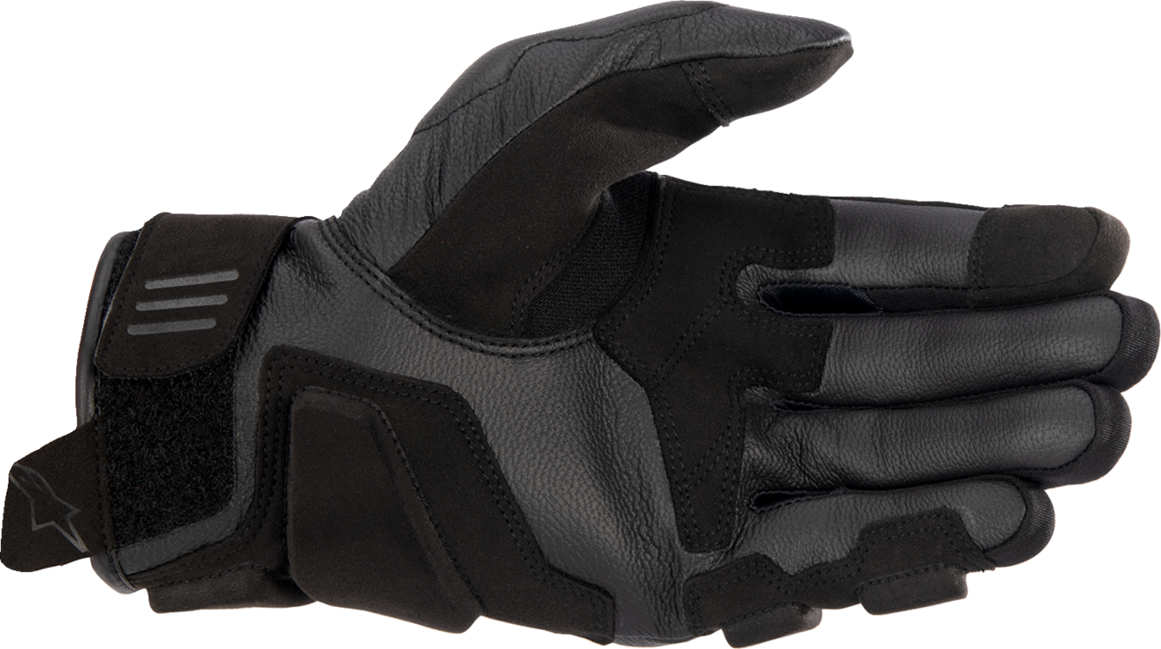 Black Alpinestars Women Stella Phenom Gloves, large size, showing the sleek design and protective features of motorcycle gloves.