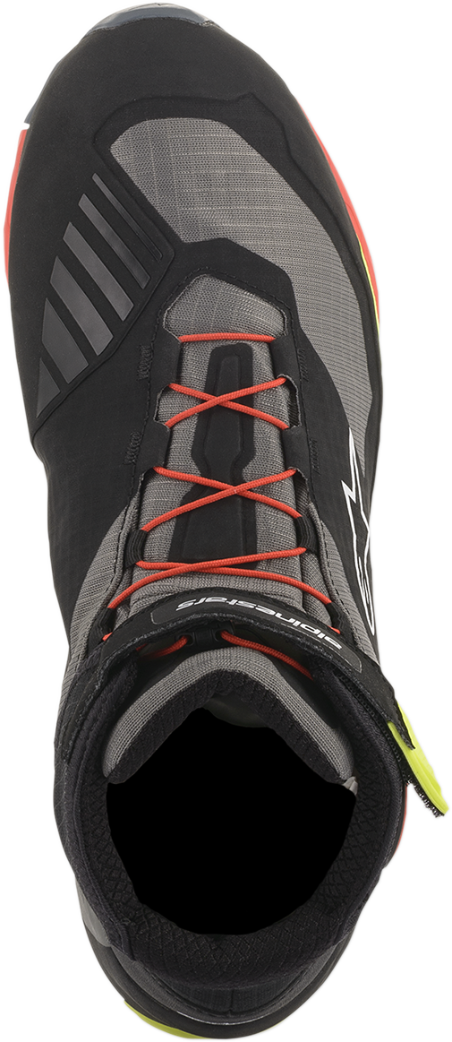 Alpinestars CR-X Drystar® motorcycle shoes in black, red, and yellow fluorescent with reinforced toe and ankle protection.